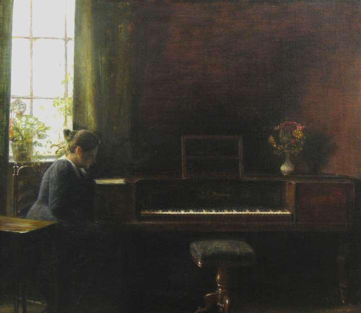 “Interior with a woman sitting at the piano”